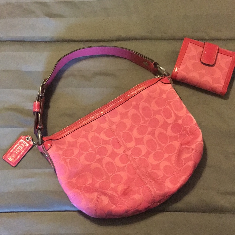 Pink Coach purse with matching wallet
